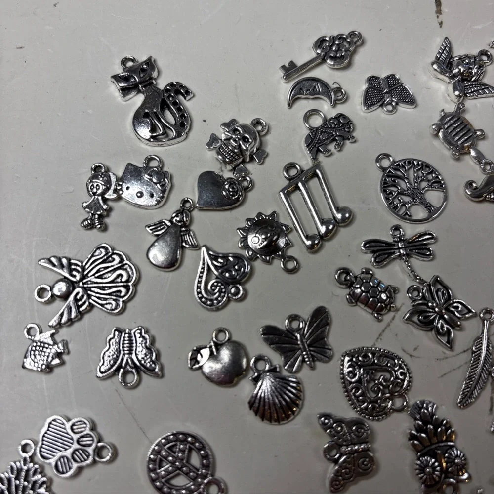 VTG 102 Silver Tone Mixed Charm Lot for Making Jewelry
